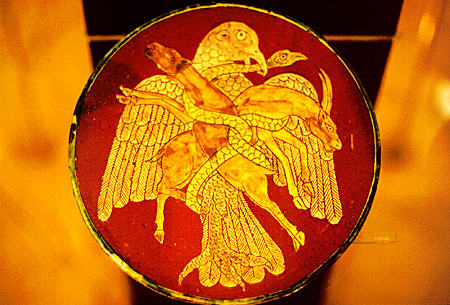 Plate with eagle, deer & snake in Museum of Greek Folk Art in a Mosque built 1759, Athens. Greece.