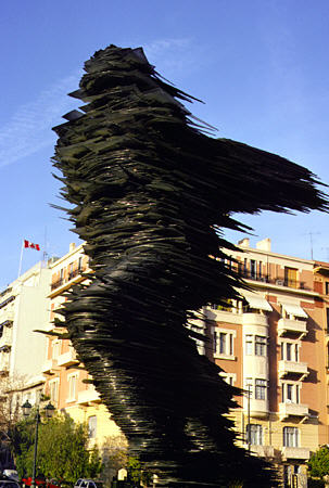 Glass man sculpture at Megali Tou in Genous Scholi Square, Athens. Greece.