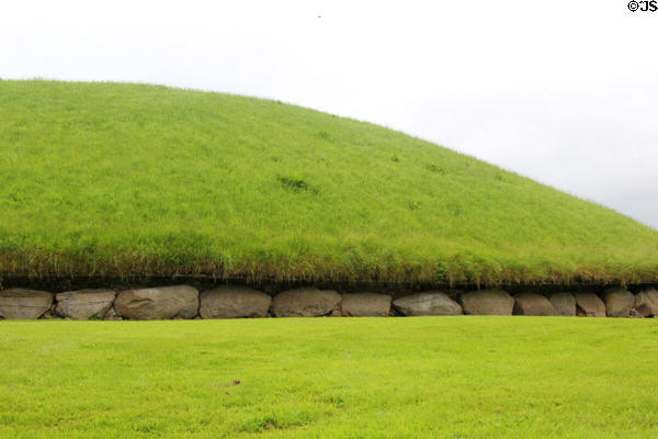 Carved Neolithic stones encircling main passage grave (c3200 BCE) at Knowth. Ireland.