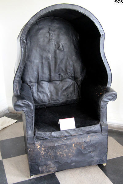 Chair with wings to keep away drafts at Castletown House. Ireland.