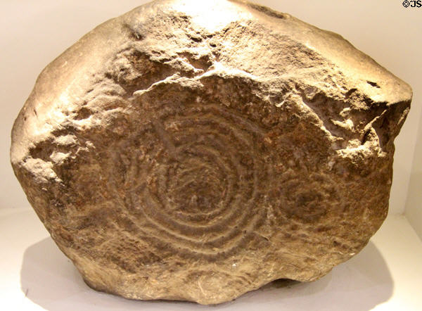 Megalithic decorated stone (2500-1700 BCE) from Loughcrew at National Museum of Ireland Archaeology. Dublin, Ireland.