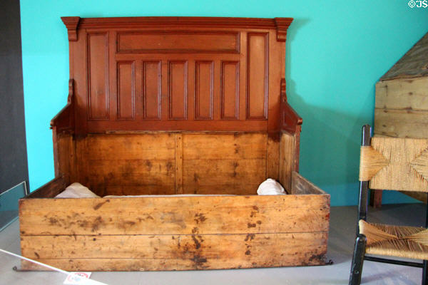 Dual purpose settle & bed (mid 19thC) common in Irish farm homes since 18th C at National Museum Decorative Arts & History. Dublin, Ireland.