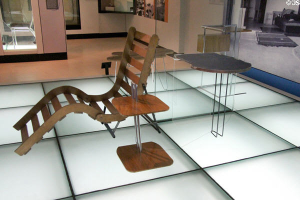 S-bend folding terrace chair (1935) & various occasional tables (1926-9) by Eileen Gray at National Museum Decorative Arts & History. Dublin, Ireland.