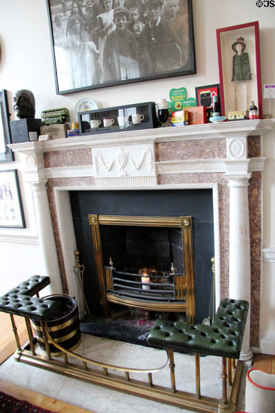Georgian fireplace with seating at Little Museum of Dublin. Dublin, Ireland.