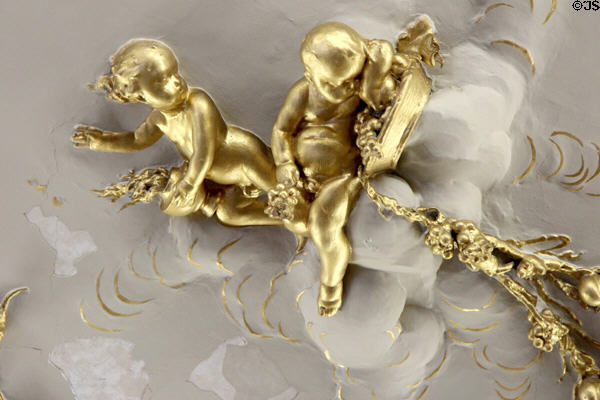Gilded cherubs of sculpted ceiling in council of state room at Aras an Uachtarain. Dublin, Ireland.
