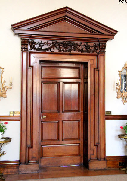 Door with pediment in entrance hall at Russborough House. Ireland.
