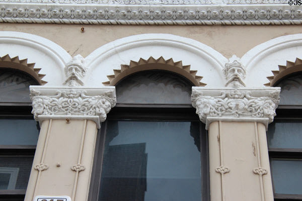 Commercial building with Irish kings & themes (24 Grafton St.). Dublin, Ireland.