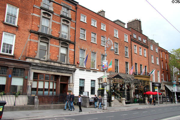 Streetscape with small commercial buildings (33-46 Dawson St.). Dublin, Ireland.