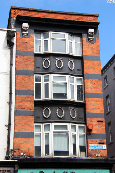 Facade details of commercial building at Dame St. & Sycamore St. Dublin, Ireland.