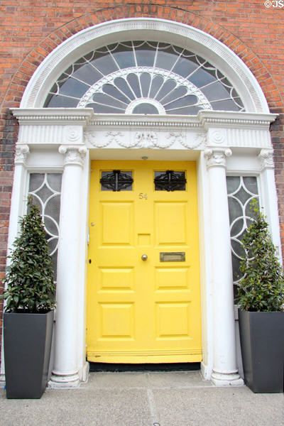 Yellow Georgian door on Merrion Square. Dublin, Ireland.