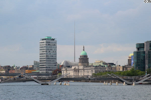 River Liffey with Liberty Hall & Custom House over Seán O'Casey Bridge. Dublin, Ireland.