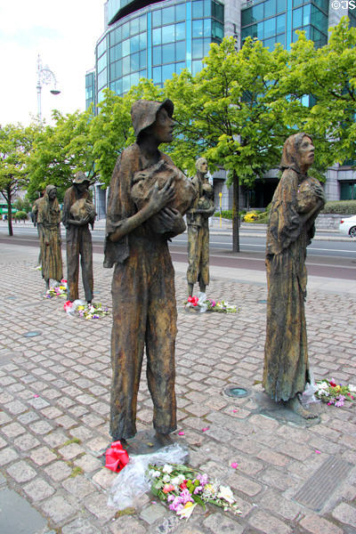 Sculpted victims of Great Famine at Famine Monument on Custom House Quay. Dublin, Ireland.