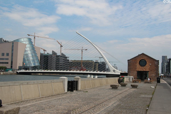 Samuel Beckett Bridge & Dublin Convention Center over River Liffey. Dublin, Ireland.