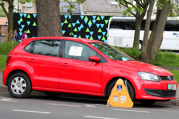 Car locked with boot. Dublin, Ireland.