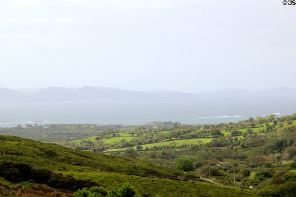 View though mist towards ocean & hills from Staigue Fort on Ring of Kerry. Ireland.