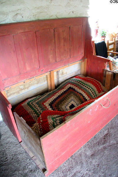 Bench which opens to a bed at Kissane's farm at Muckross Traditional Farms in Killarney National Park. Killarney, Ireland.