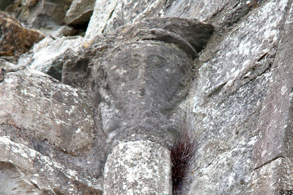 Carved Sheela-na-Gig female figure to keep evil spirits away at Boyle Abbey. Knocknashee, Ireland.