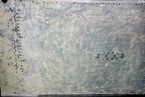 Faded stenciling at Irish Workhouse Centre. Portumna, Ireland.