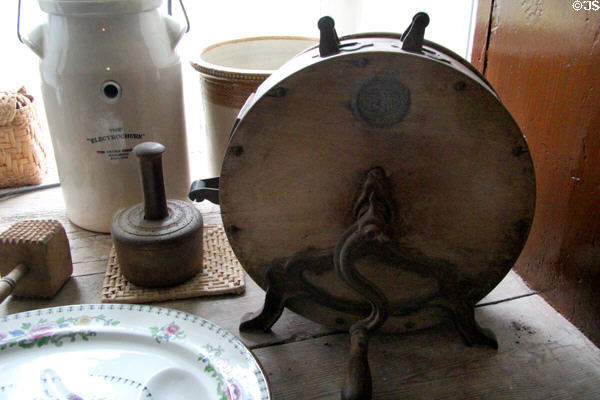 Kitchen knife cleaner beside electrochurn at Strokestown Park. Vesnoy, Ireland.