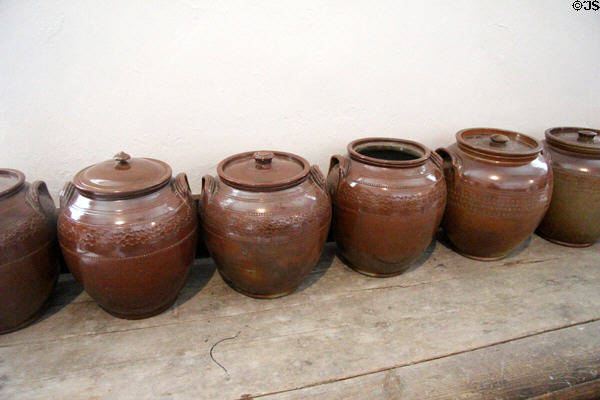 Ceramic brown stoneware storage jugs at Strokestown Park. Vesnoy, Ireland.