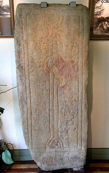 Medieval Christian tombstone at Glendalough Visitor Centre. Ireland.