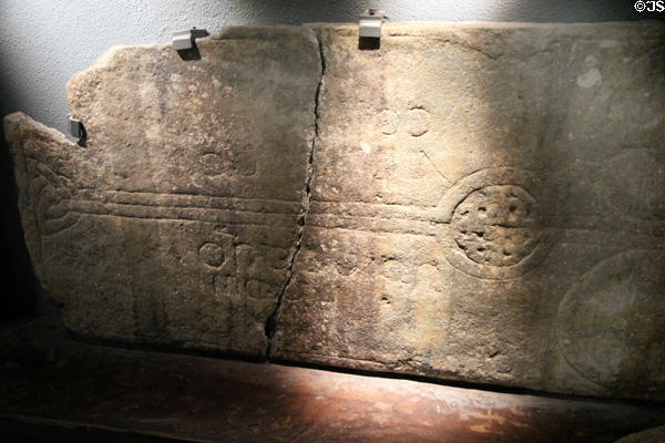 Medieval Christian tombstone at Glendalough Visitor Centre. Ireland.