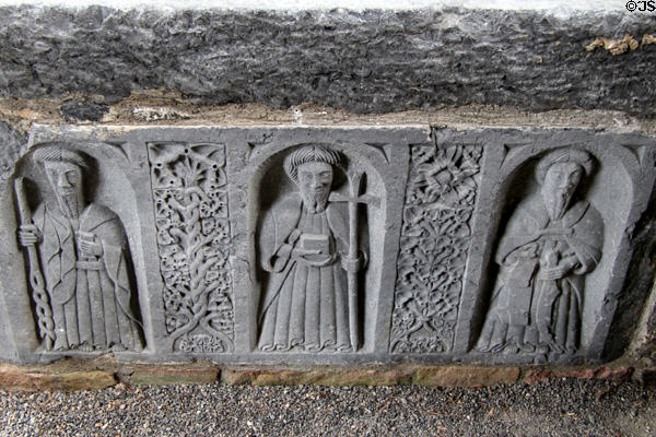 Carved saints between Celtic knots at Jerpoint Abbey. Ireland.