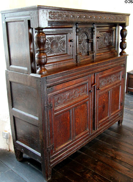 Oak cabinet with turned corner upper posts at Rothe House. Kilkenny, Ireland.