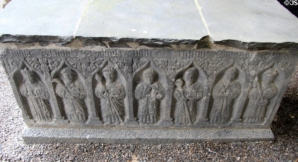 Tomb carved with saints (16thC) in cathedral at Rock of Cashel. Cashel, Ireland.