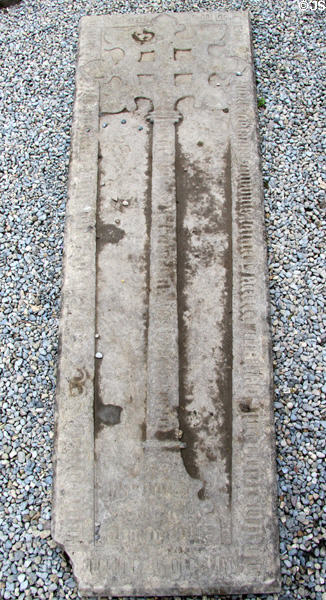 Tomb slab with cross in cathedral at Rock of Cashel. Cashel, Ireland.