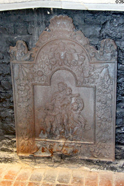 Cast iron fireplace back with classical scene at Cahir Castle. Cahir, Ireland.