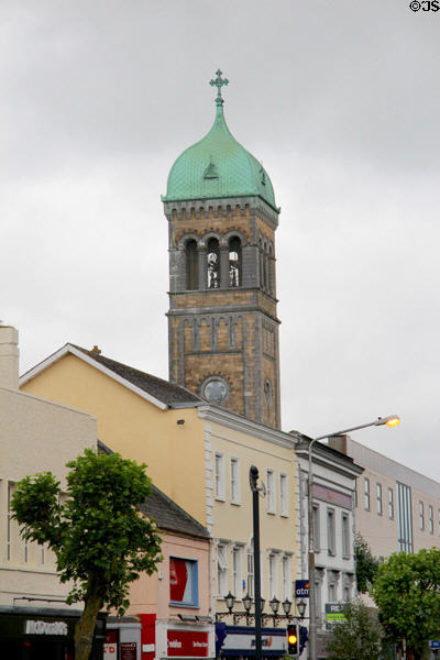 Saints Peter and Paul's church tower over Gladstone Street. Clonmel, Ireland.