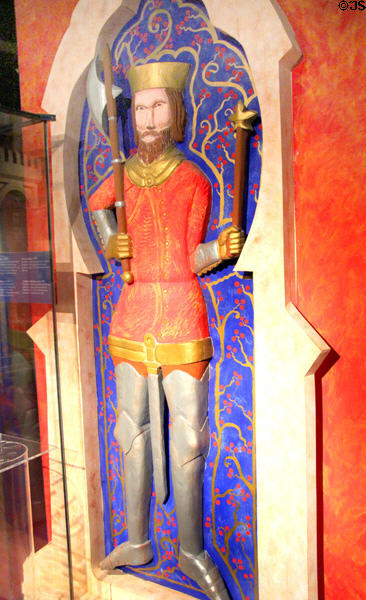 Modern carving of Medieval king in gallery displaying Museum of Treasures' Great Charter Roll. Waterford, Ireland.