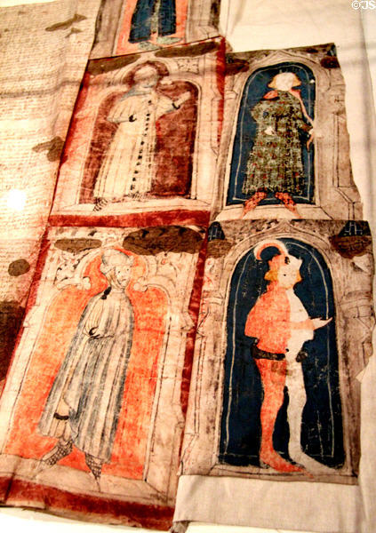 Pages of Great Charter Roll (c1372) with portraits of Justiciars or king's rulers of Ireland were used as support for Waterford's shipping monopoly & which show dress styles of 14th C at Museum of Treasures. Waterford, Ireland.