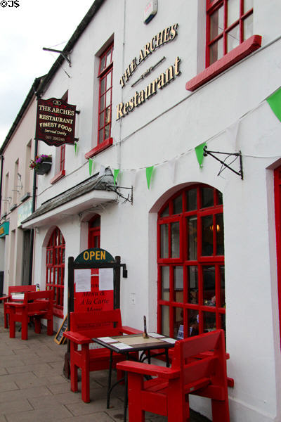 The Arches red trimmed restaurant on Main Street. Adare, Ireland.