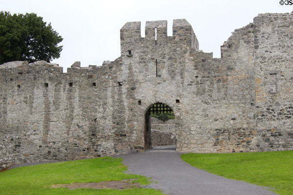 Entrance & portcullis to Desmond Castle. Adare, Ireland.
