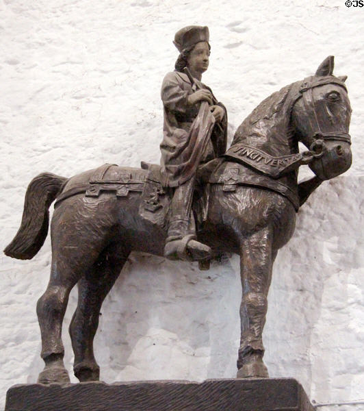 Wood equestrian stature with the heraldic motto "vincit veritas" or "truth prevails" in Great Hall at Bunratty Castle. County Clare, Ireland.
