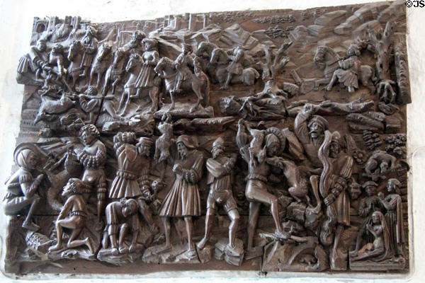 Medieval relief scene created in wood at Bunratty Castle. County Clare, Ireland.
