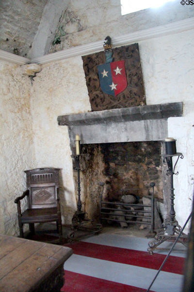 Fireplace & side chair in Earl's private apartments at Bunratty Castle. County Clare, Ireland.