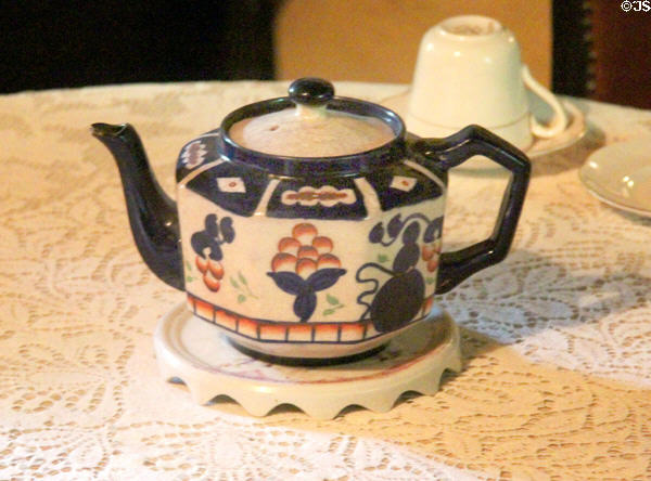 Teapot in Mountain Farmhouse at Bunratty Castle & Folk Park. County Clare, Ireland.