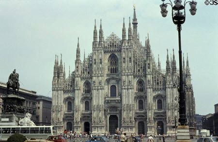 Duomo or Cathedral facade with ornate spires. Milan, Italy.