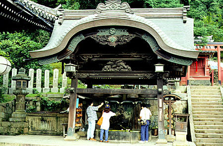 Drinking fountain at the entrance of a temple in Nara. Japan.