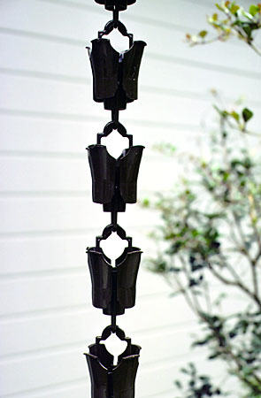 Drain chain, used instead of rain runoff downspouts in Takayama. Japan.
