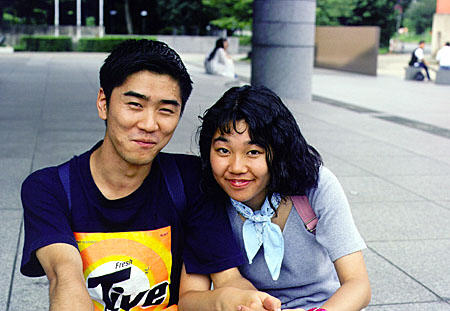 Young couple poses together in Kyoto. Japan.