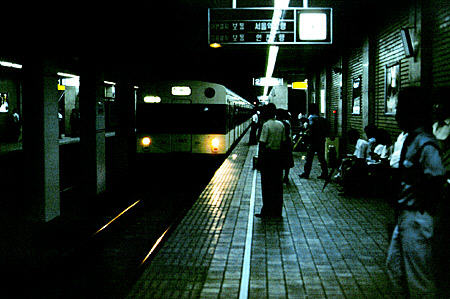 Subway train arrives at station in Seoul. South Korea.
