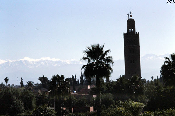 Koutoubia of Marrakesh with Atlas mountains in distance. Marrakesh, Morocco.