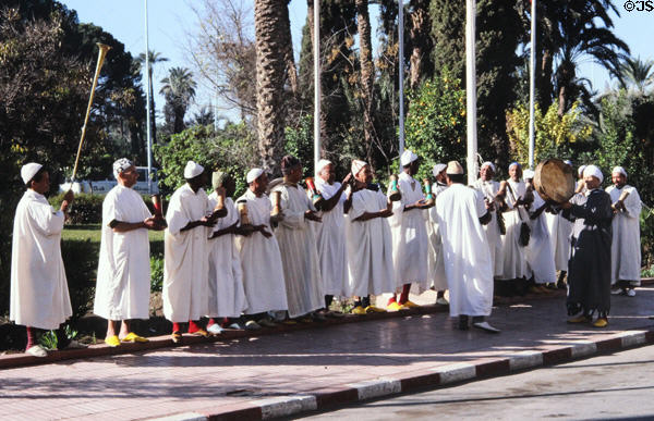 Musicians with traditional instruments & dress in Marrakesh. Marrakesh, Morocco.