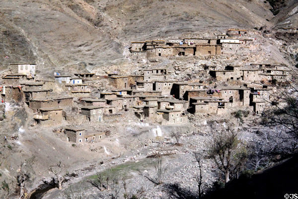 Terraced village in Atlas mountains seen from road between Marrakesh & Tizi-n-Tichka. Morocco.