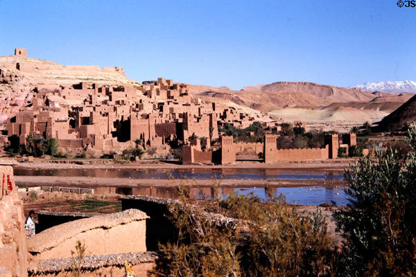 Ait Benhaddou with Atlas Mountains beyond. Morocco.