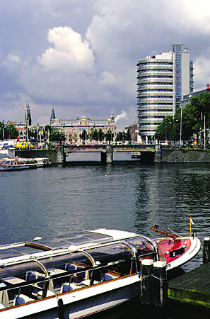 Openhaven to the left of Amsterdam Centraal Station. Amsterdam, Netherlands.